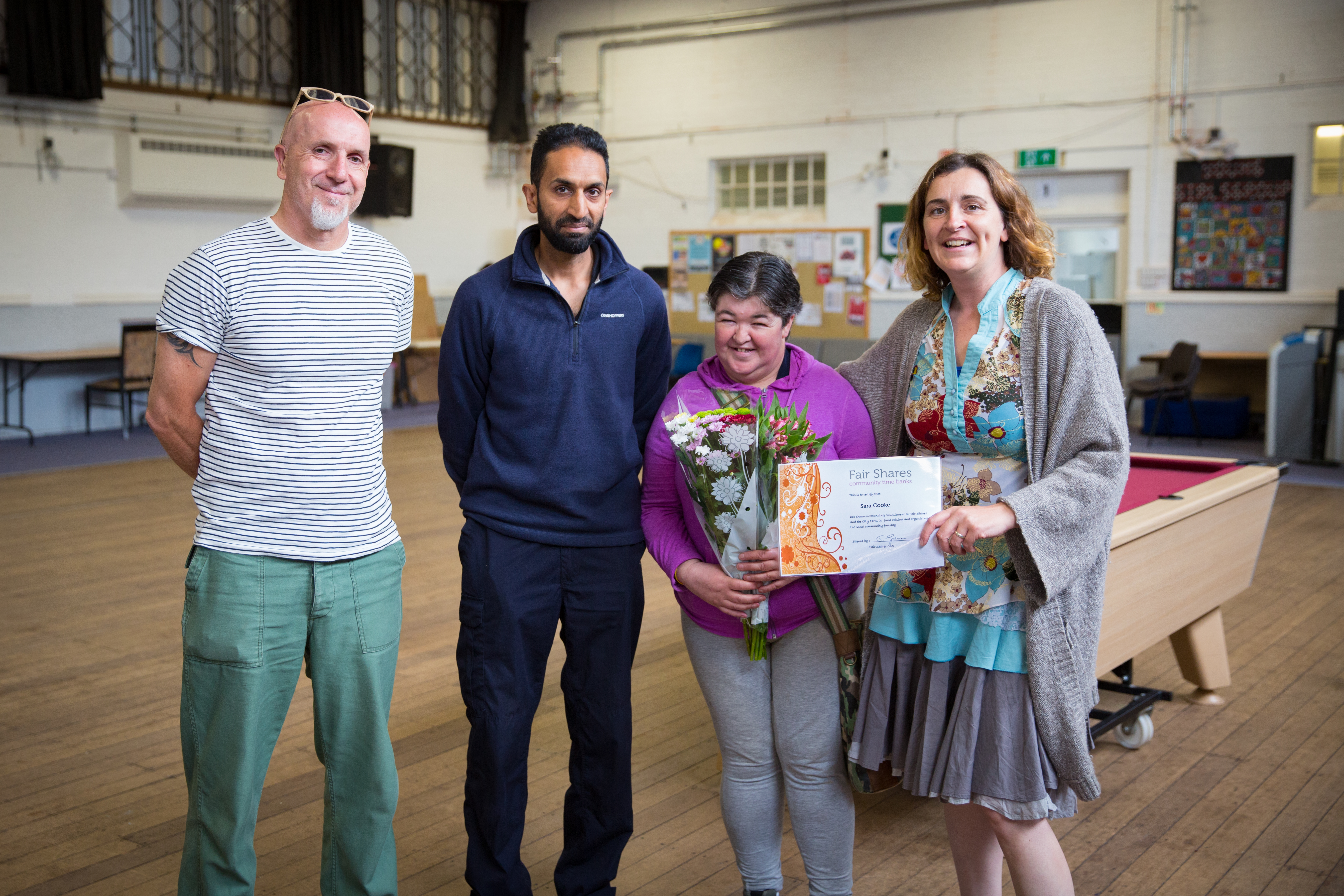 Sarah receiving her certificate