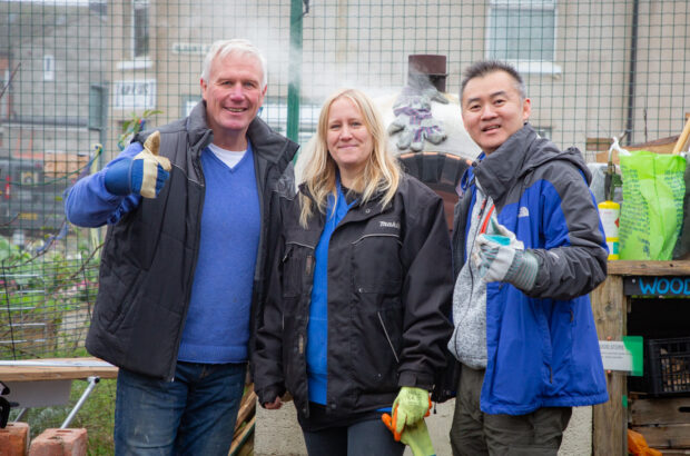 Rachel smiling alongside two Spirax Sarco volunteers.