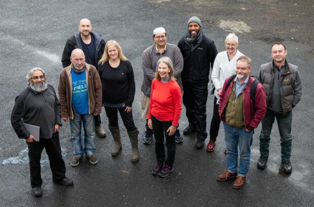 A group photo of all the members of staff at Fair Shares. From left to right: Reyaz, Gary, Jon, Rachel, Ashraf, Sue, Lloyd, Kathy, Chris, Tim.