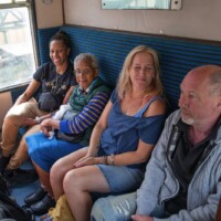 Rachel, Gary and two participants all sat in a cabin on the train.