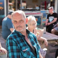 Kevin, one of our participants, sat down at the seafront plaza area.