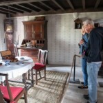 Two participants in an old fashioned house at St Fagans.