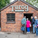 Some participants looking into an old bakery at St Fagans.