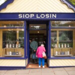 Some participants walking into an old candy store at St Fagans.